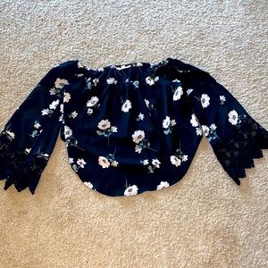 Long sleeved off-the shoulder top